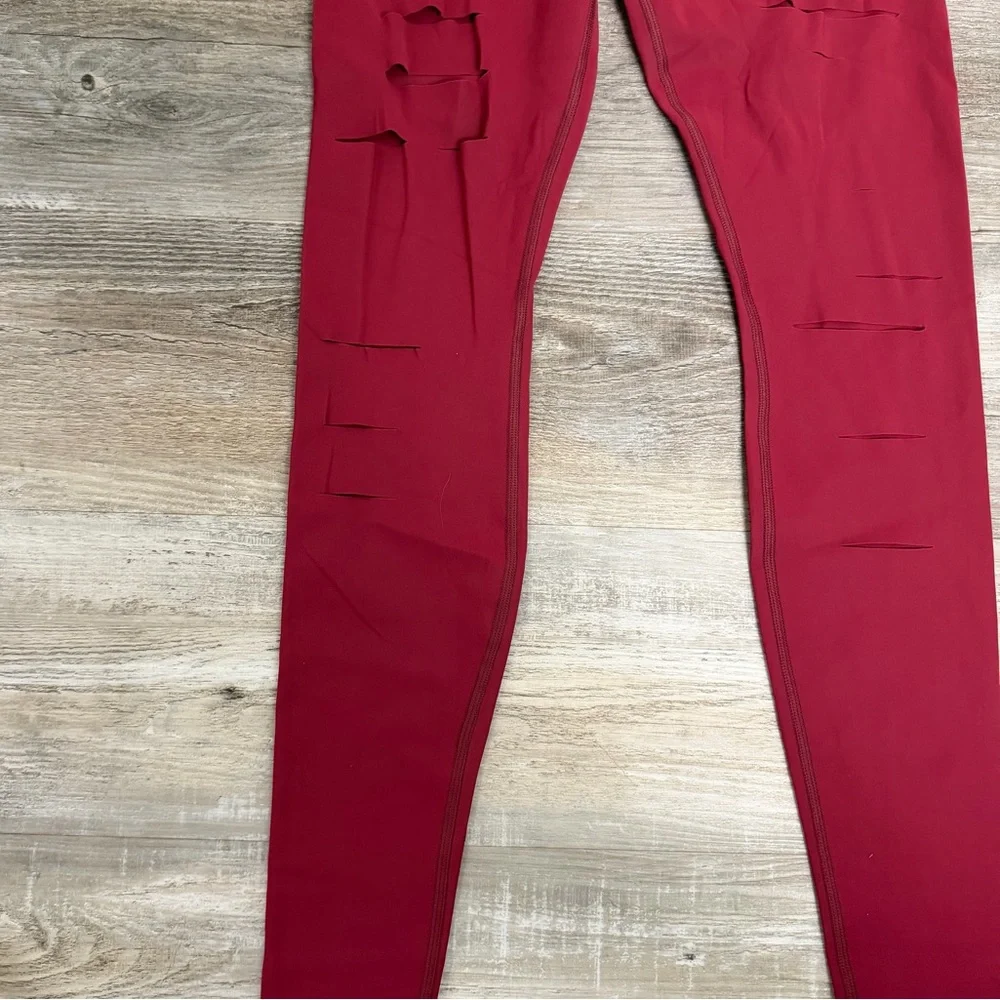 Alo Yoga High Waisted Ripped Warrior Leggings in Red-size Medium *NEW w/o tags*